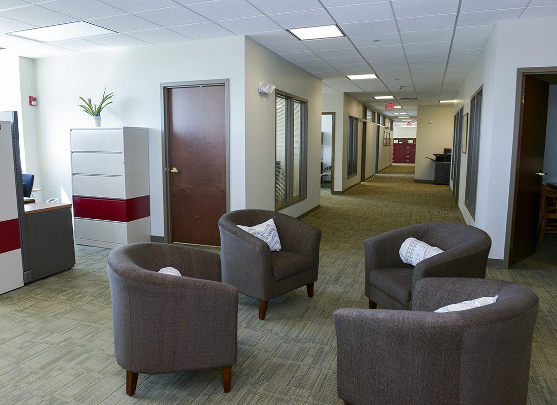 About Our Agency - View of Chairs Around a Circle in the Hallway of the Arbor Insurance Group Office